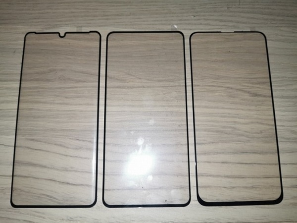 Ảnh mặt kinh P30 Pro bên trái, Honor Magic 2 bên phải và P40 Pro ở giữa