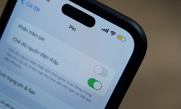 A cell phone on rocks
Description automatically generated