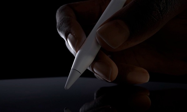 A close-up of a hand holding a stylus
Description automatically generated