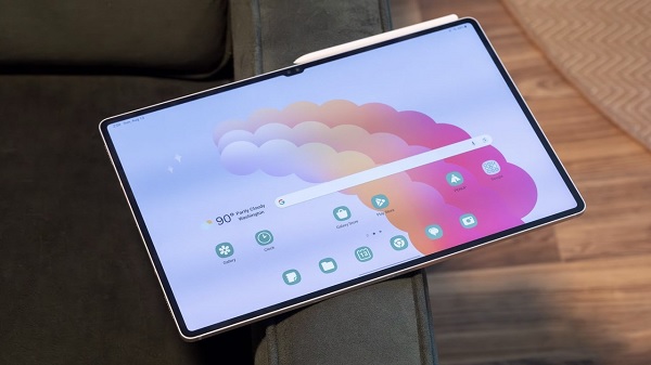 A tablet on a couch
Description automatically generated
