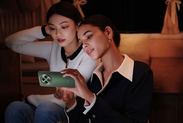 A person looking at a cell phone
Description automatically generated