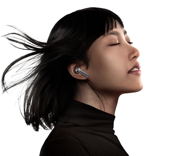 A person with her eyes closed
Description automatically generated