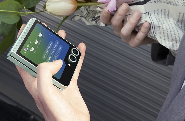 A cell phone next to a white case
Description automatically generated