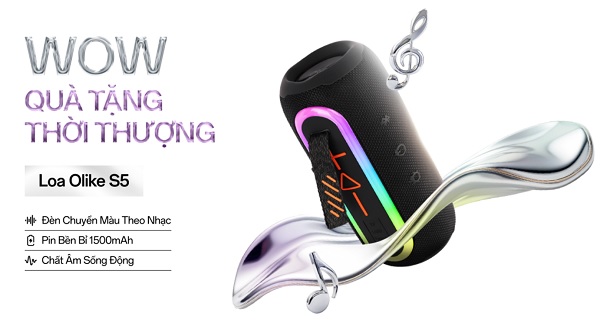 A black speaker with a rainbow colored handle and a silver spoon
Description automatically generated with medium confidence