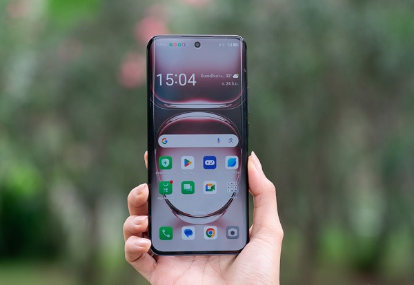 A cell phone on a white surface
Description automatically generated