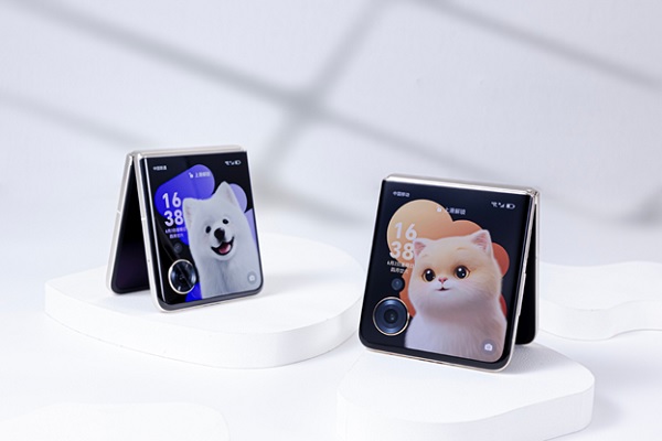 A pair of smart phones on a table
Description automatically generated