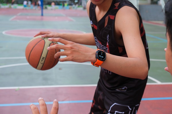 A person looking at his watch

Description automatically generated