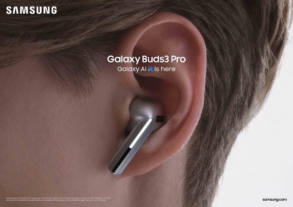 A close-up of a silver wireless earbuds
Description automatically generated