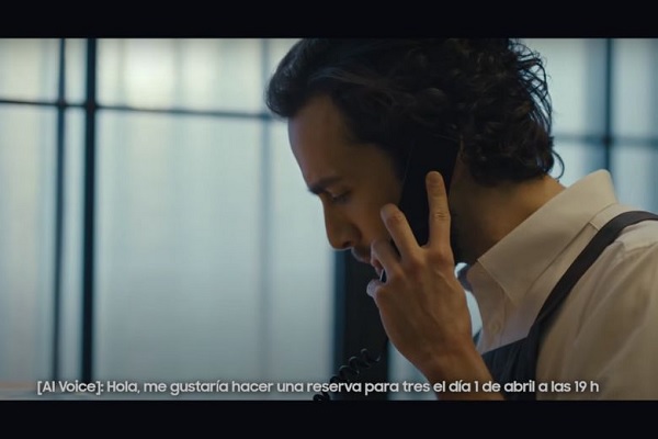 A person talking on a phone
Description automatically generated