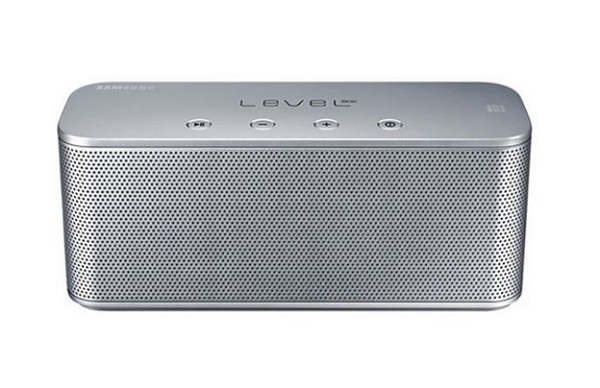 A rectangular silver speaker with buttons

Description automatically generated