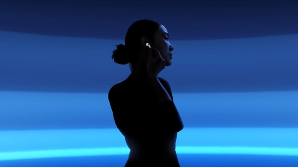 A silhouette of a person with a blue background
Description automatically generated