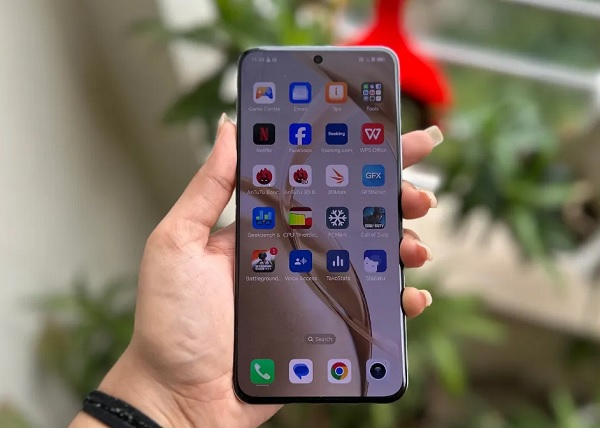 A cell phone with a reflection of the sky
Description automatically generated