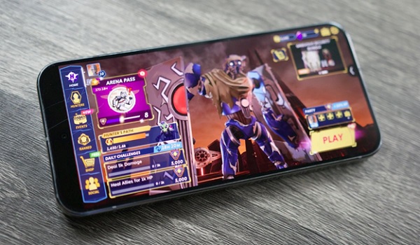 A cell phone with a video game screen
Description automatically generated