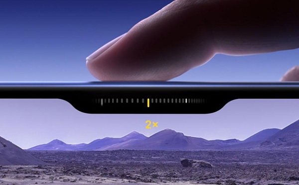 A finger on a device
Description automatically generated