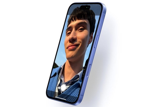 A cell phone with a person's face on the screen
Description automatically generated