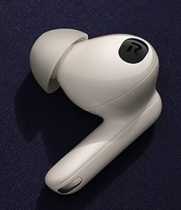 A white earbuds on a blue surface
Description automatically generated