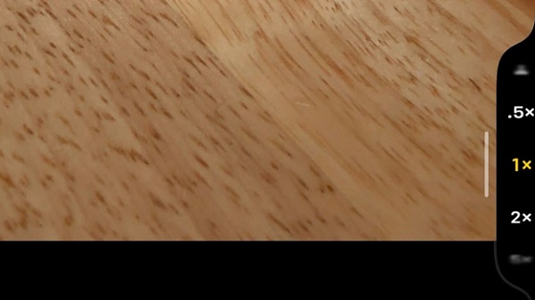 A close-up of a wood grain
Description automatically generated