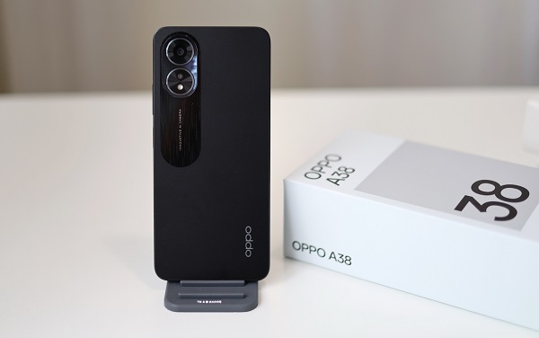 A cell phone with water splashing out of it
Description automatically generated