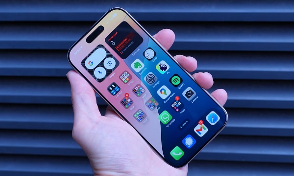 A silver cell phone with a logo
Description automatically generated