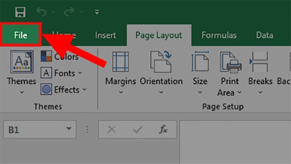 Mở file Excel > Chọn tab File