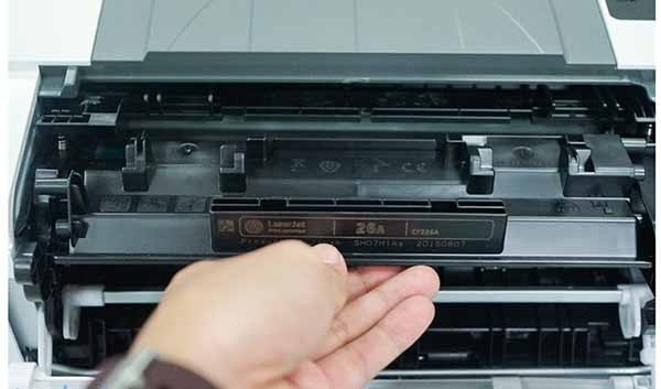 Nguyên nhân lỗi do cảm biến đóng mở nắp máy in hư hỏng