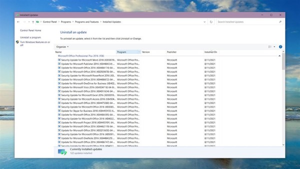 Chọn Programs > View installed updates